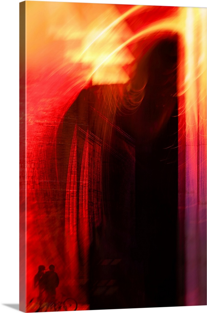 Abstract vertical photograph of swirls of bright red and yellow light with a couple with a bicycle looking on.