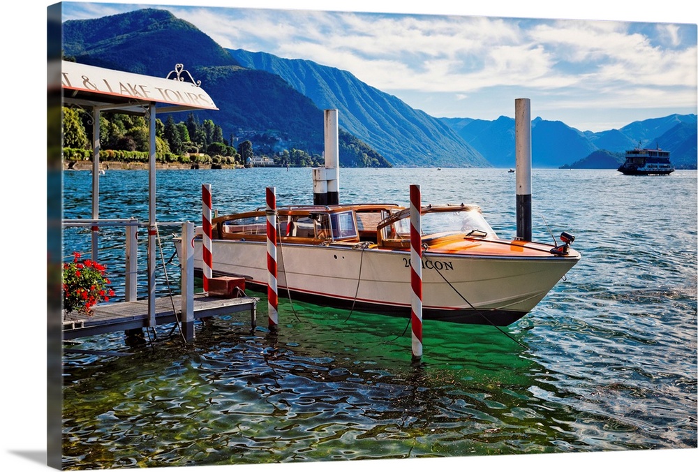 Fine art photo of a boat at the dock in a lake in Como, Italy.