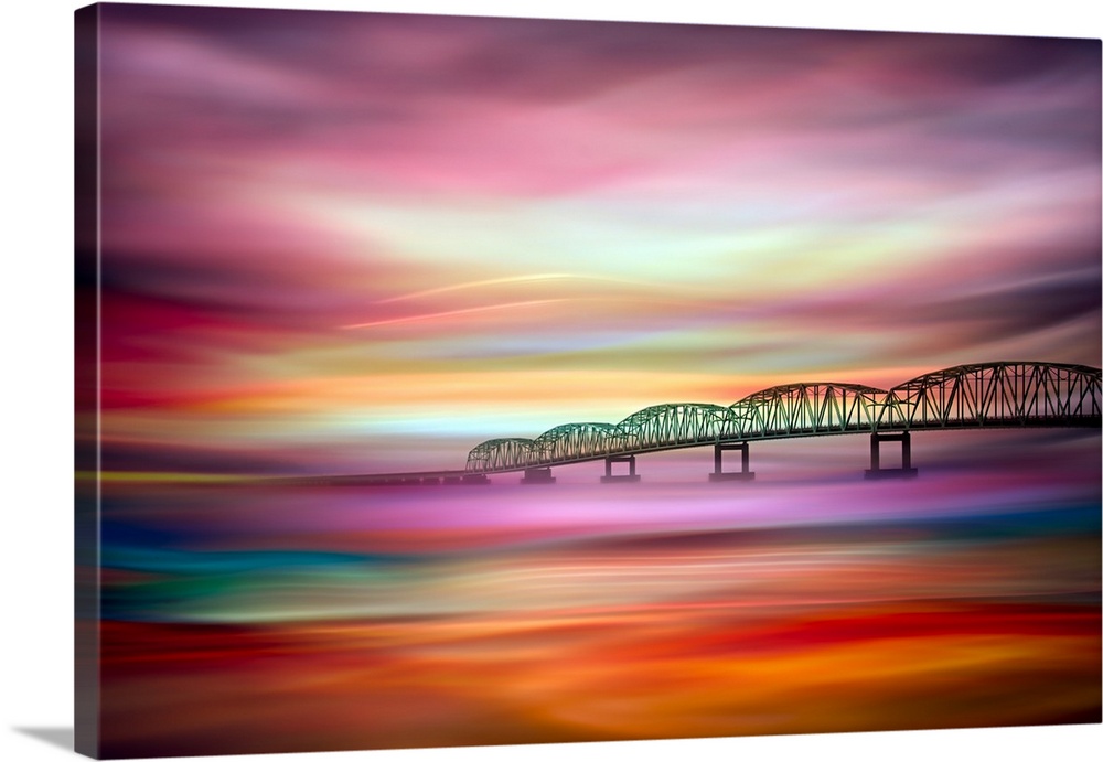 An abstract photograph of a bridge seen in the distance of an abstract landscape.
