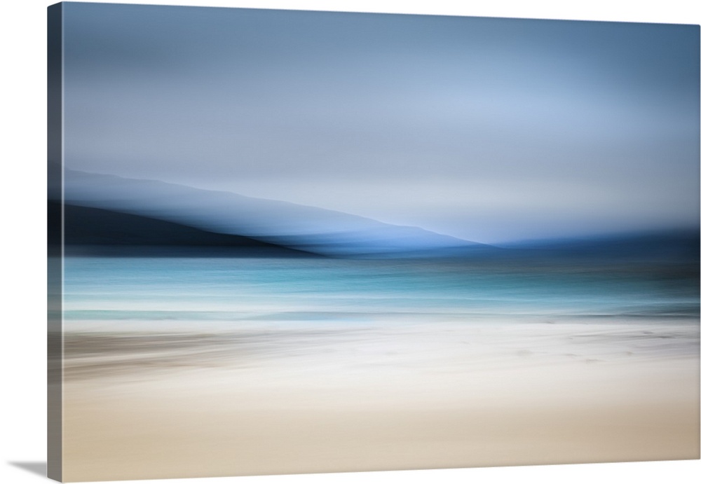 Calming abstract landscape beach scene with mountains, teal water, and grey sky.