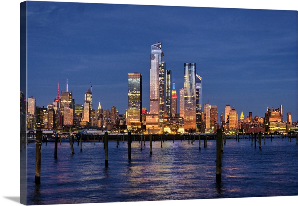 Buildings of Midtown Manhattan Illuminated at Night as Viewed from Weehawken, New Jersey