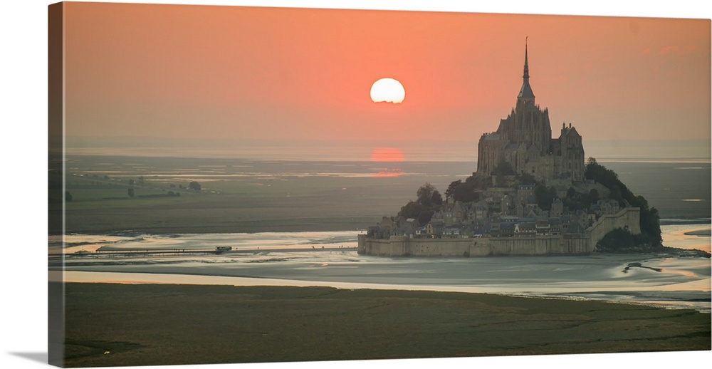 Aerial panoramic view of Mont Saint Michel at sunset.