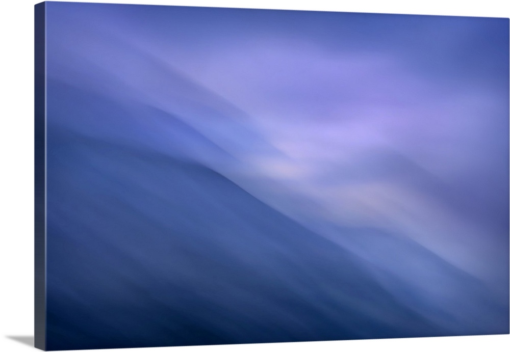 Abstract artwork of shades of blue and purple that have been smoothed to a tranquil effect.