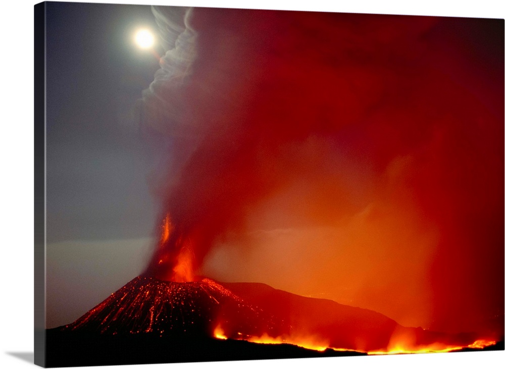 Fine art photo of a volcano erupting and spewing ash into the night sky.