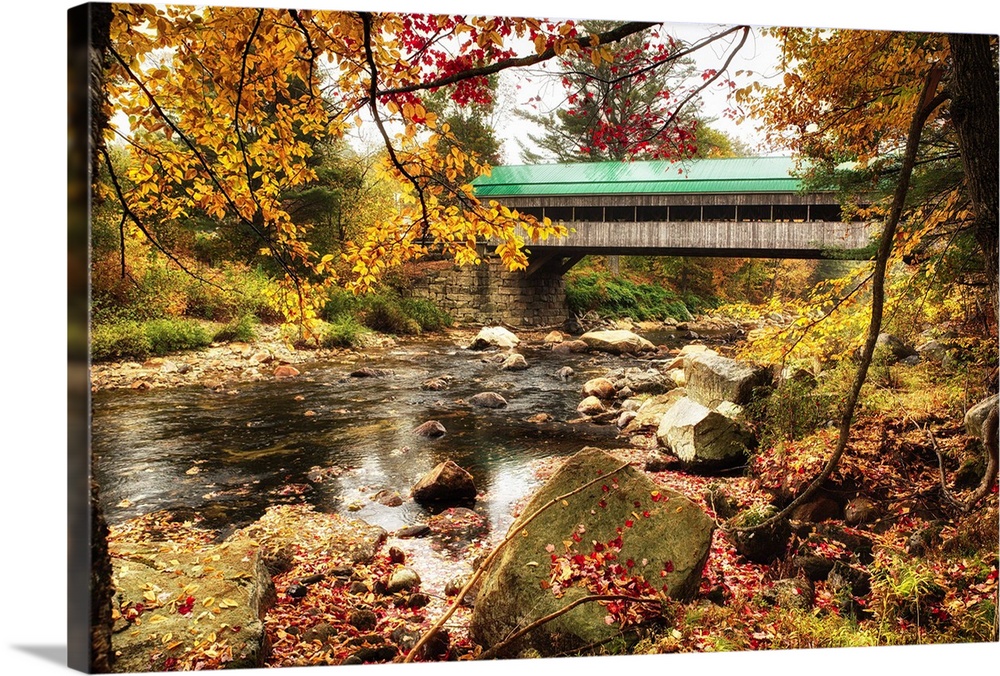Fine art photo of a covered bridge in New England over Ellis River in autumn.