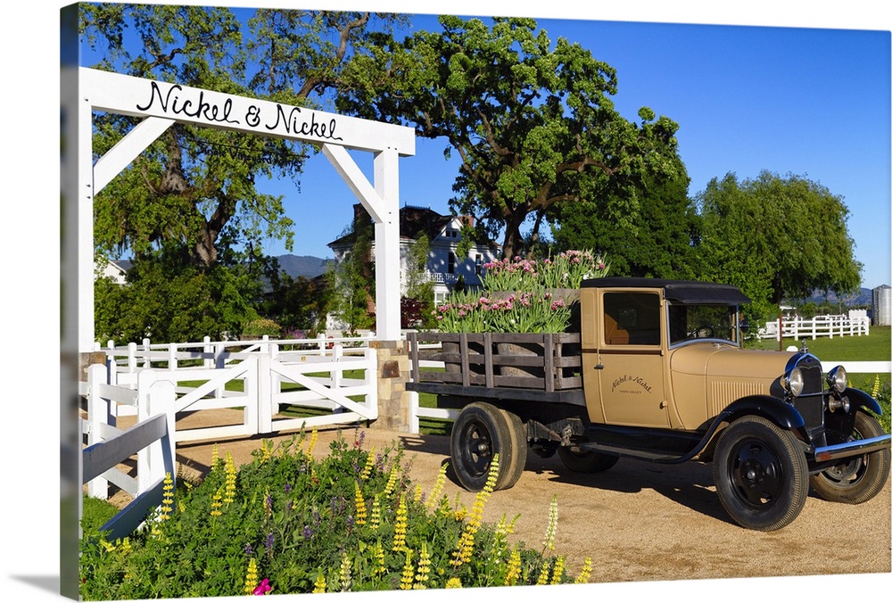 Antique truck  on display at the entrance gate of the Nickel & Nickel Winery, Rutherford, Napa Valley, California.