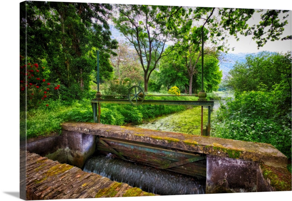 Old lock on the Ninfa Creek, Latina, Italy.