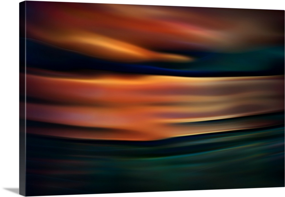 Abstract photograph of blurred and blended colors and flowing lines, with orange waves.