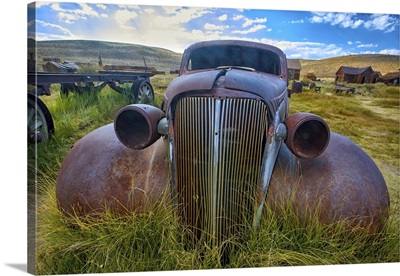 Old Car Rusting Away in a Ghost Town