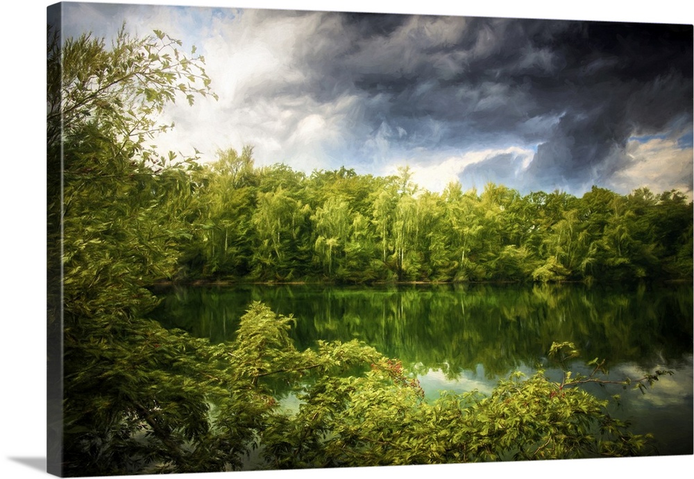 Photo Expressionism - Green forest around a lake under big clouds.