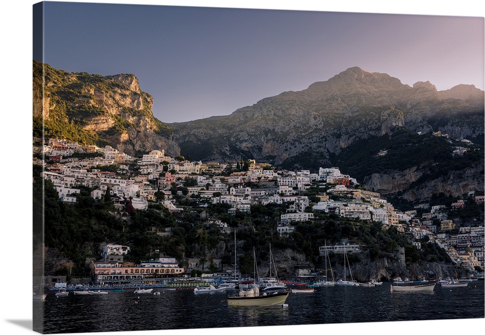 First beam of sunlight over Positano, one of Italy's most picturesque towns in Amalfi Coast.