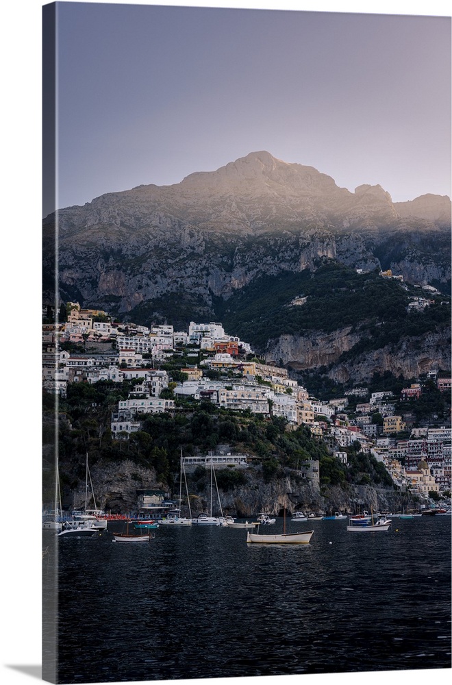 First beam of sunlight over Positano, one of Italy's most picturesque towns in Amalfi Coast.