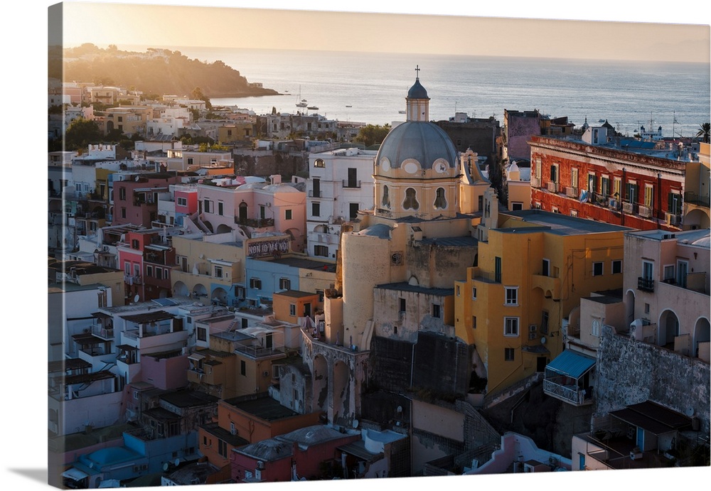 Colorful town of Procida Island, the jewel of Mediterranean, during sunset in Amalfi Coast, Italy.