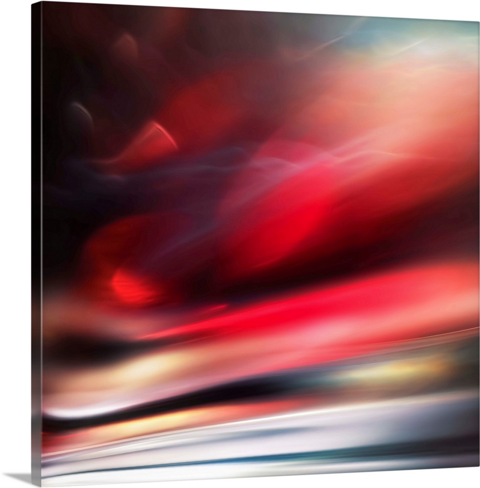 Abstract photograph of a vibrant red motion blurred color field.