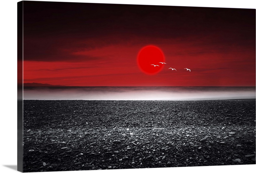 Red sunset over a black sand beach