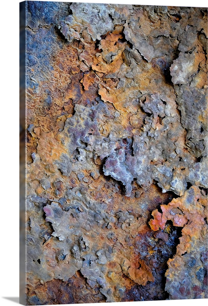 Fine art photo of a close up of flaking rust.