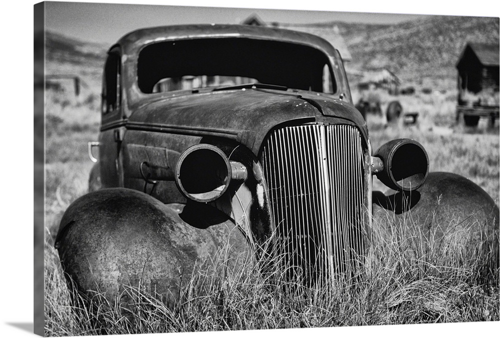 Antique car body of a 1937 Chevrolet is rusting away, Bodie California.