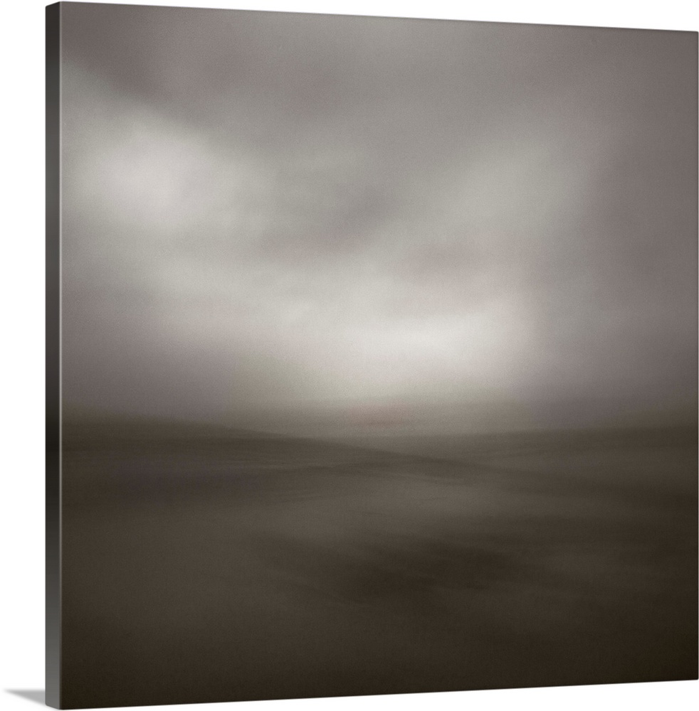 A minimal contemporary zen-like monochrome black and white sepia toned dreamy soft focus seascape.