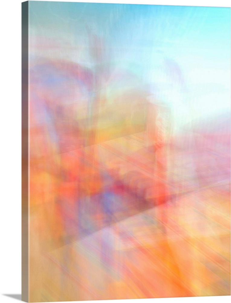 An abstract image full of energy and movement in oranges, pinks, turquoise, blues, yellows and reds.