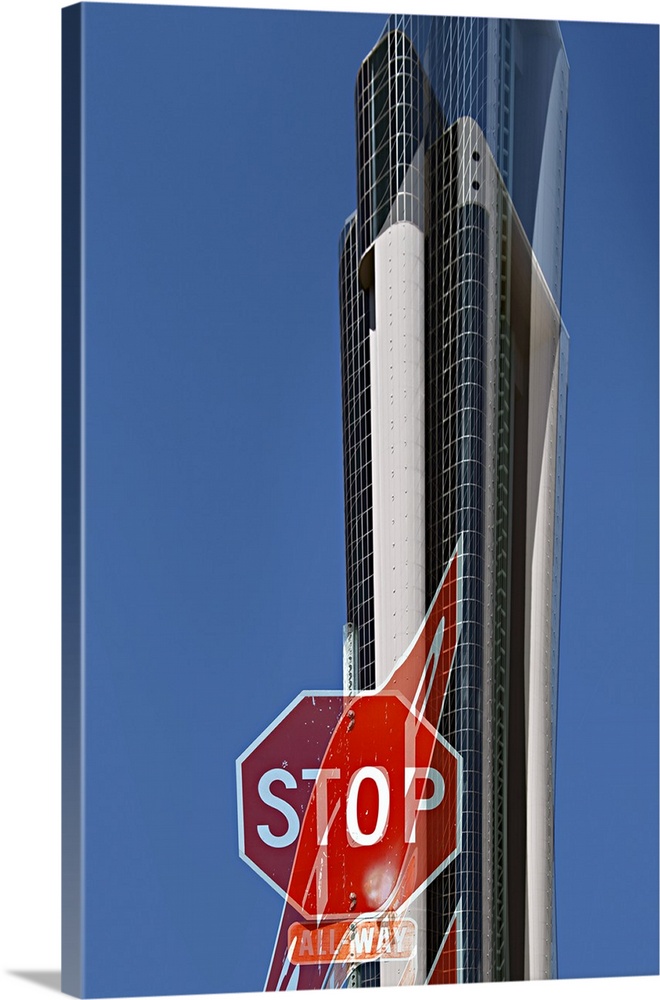 Image of a stop sign and a skyscraper in the distance, with a warped version layered over it.