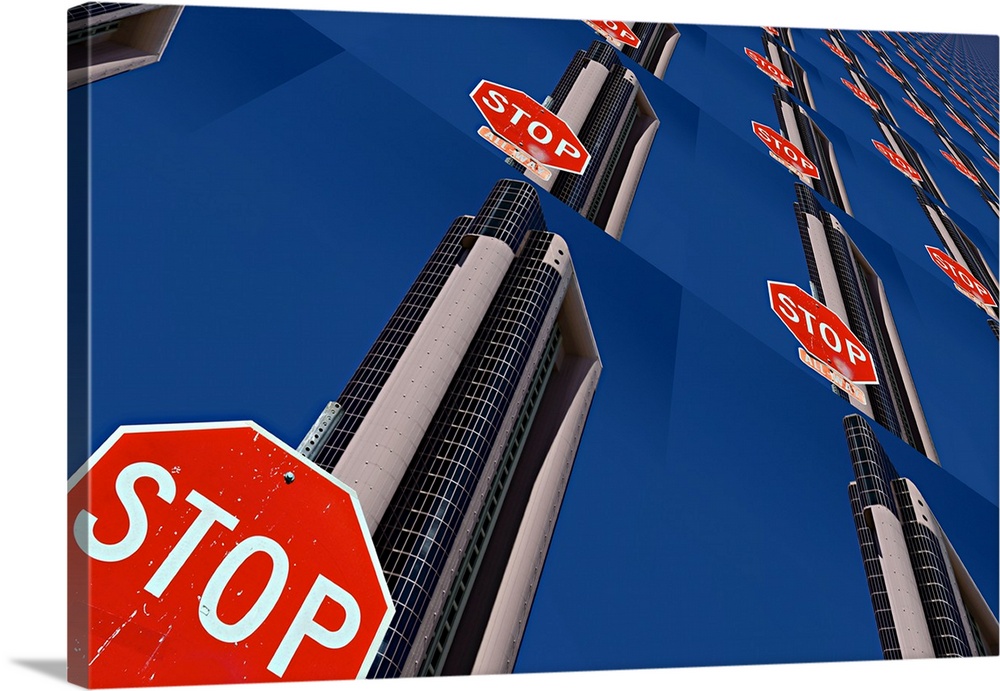 Image of a stop sign and skyscraper repeated several times into a pattern, creating an abstract image.