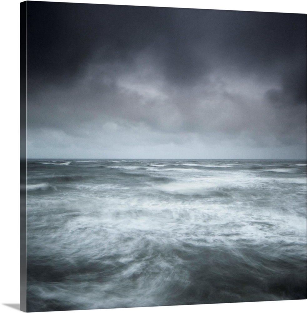 A stormy seascape, minimalist with swirling waves and a stormy sky in greys, greens, blues and silvers.