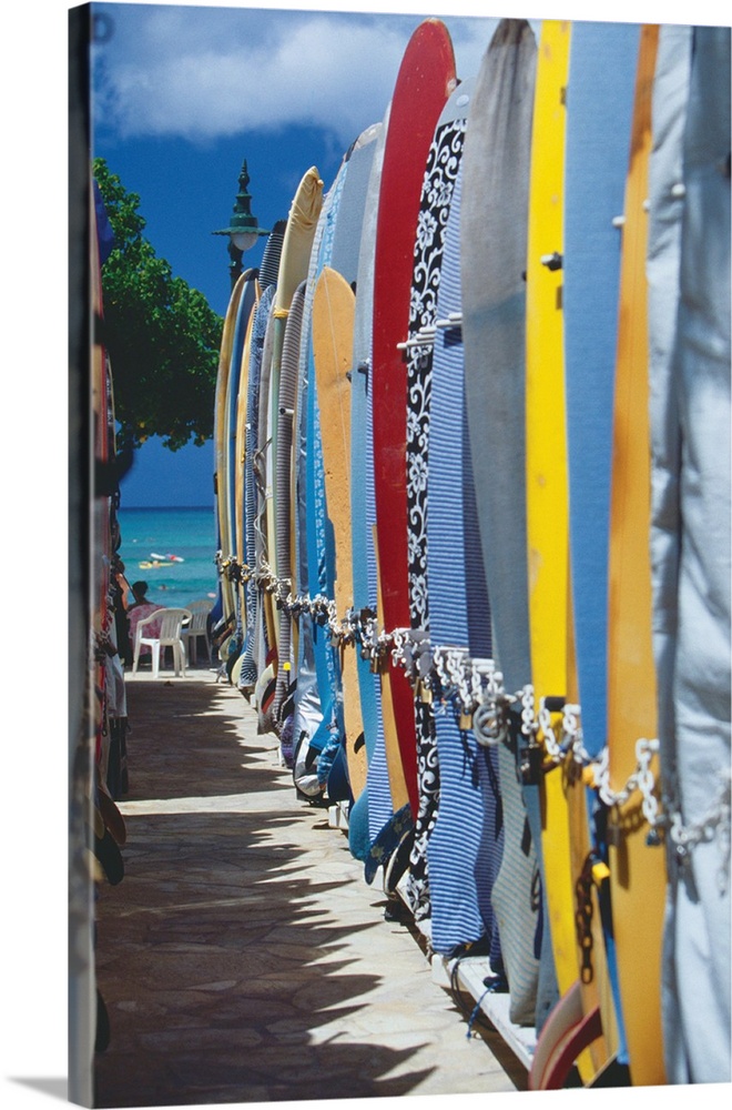 Row of colorful surfboards, Waikiki Beach, Honolulu, Oahu, Hawaii.