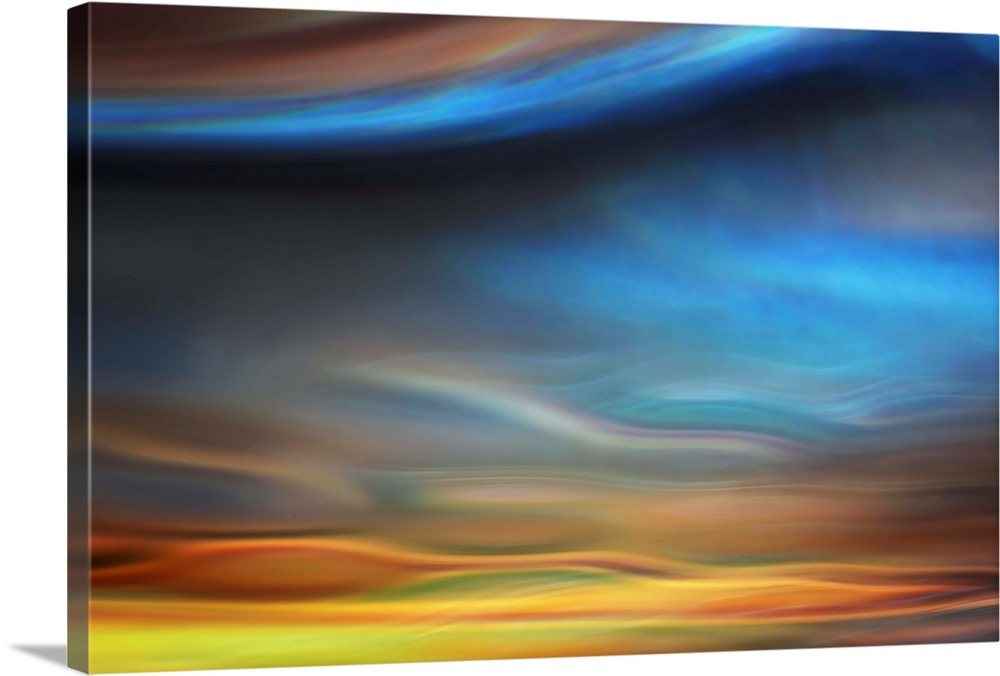 Abstract photo of smooth waves resembling the sky at sunset.