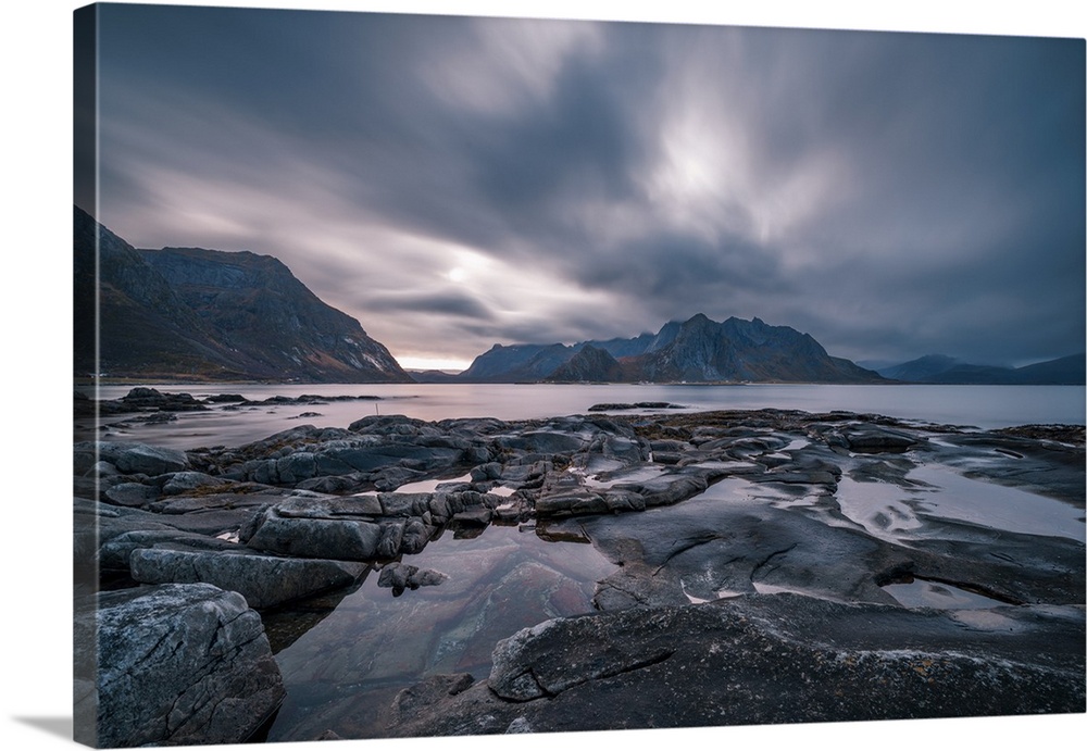 Dramatic cloud movement from long exposure in central Lofoten islands, an archipelago within the Arctic Circle in Norway, ...