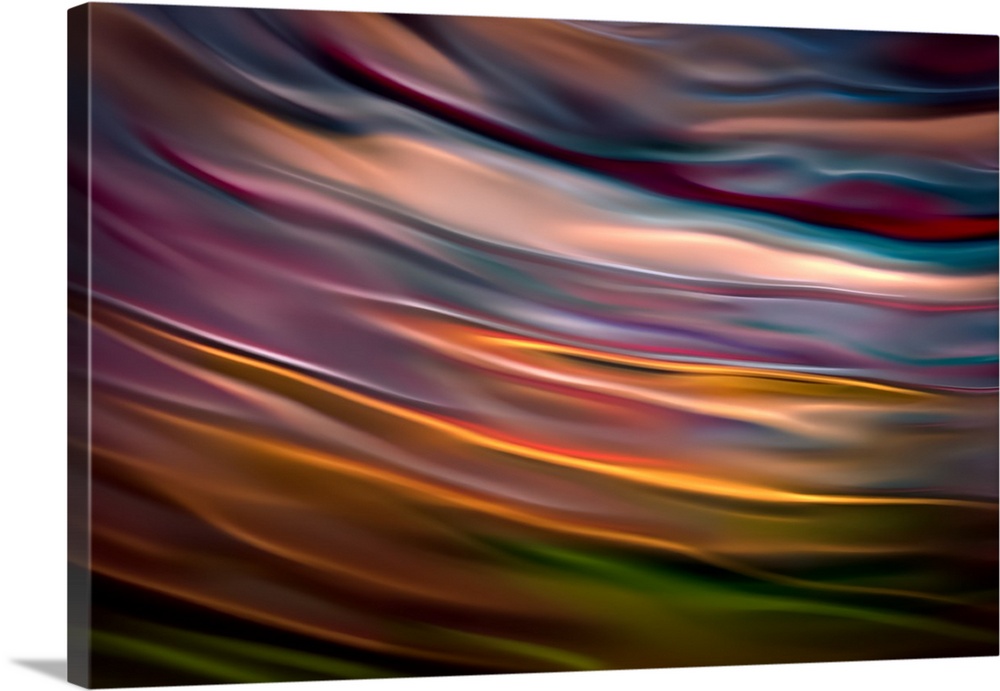 Abstract photograph in orange and blue shades resembling ocean waves.