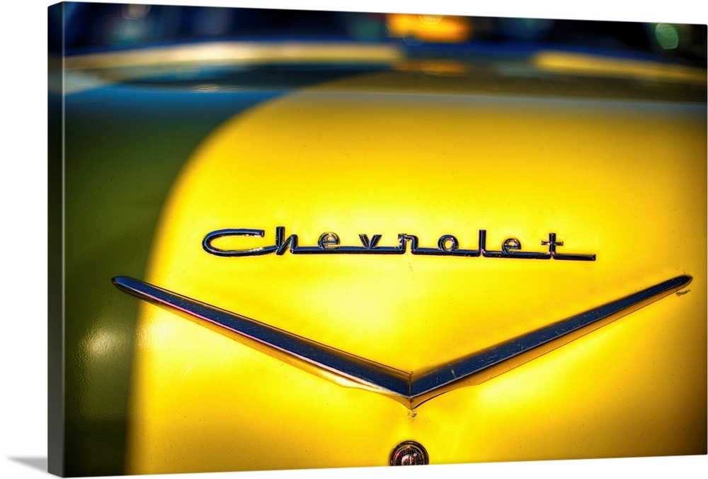 A photo of vintage Chevrolet metal emblem.