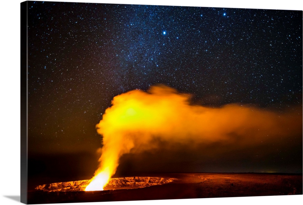 An active volcano spouting ash under a starry sky in Hawaii.