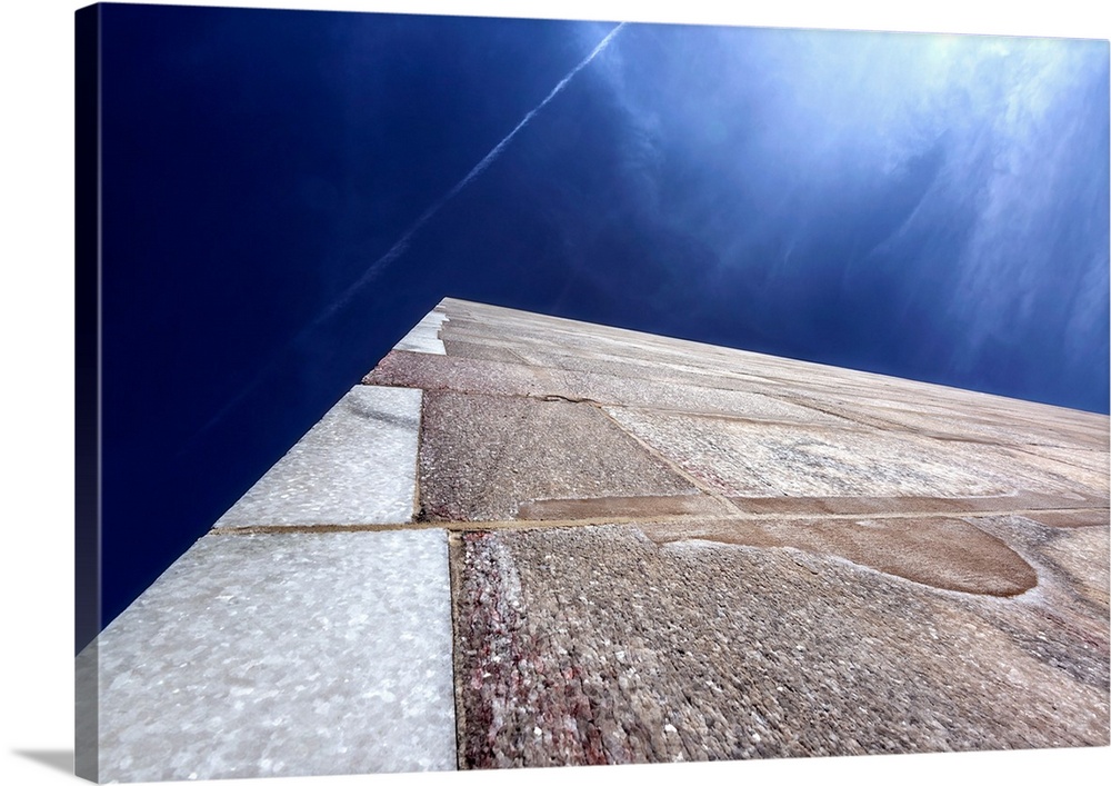 Abstract view of the Washington Monument, looking straight up into the blue sky.