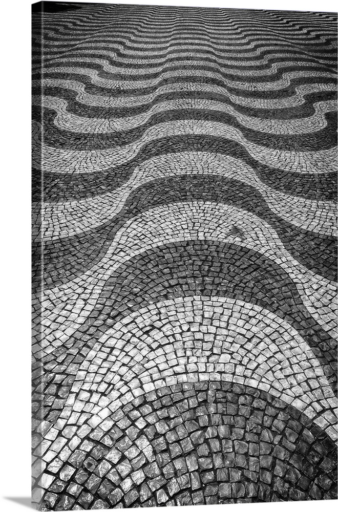 Wave Patterned Cobblestone Pavement on Rossio Square, Lisbon, Portugal.