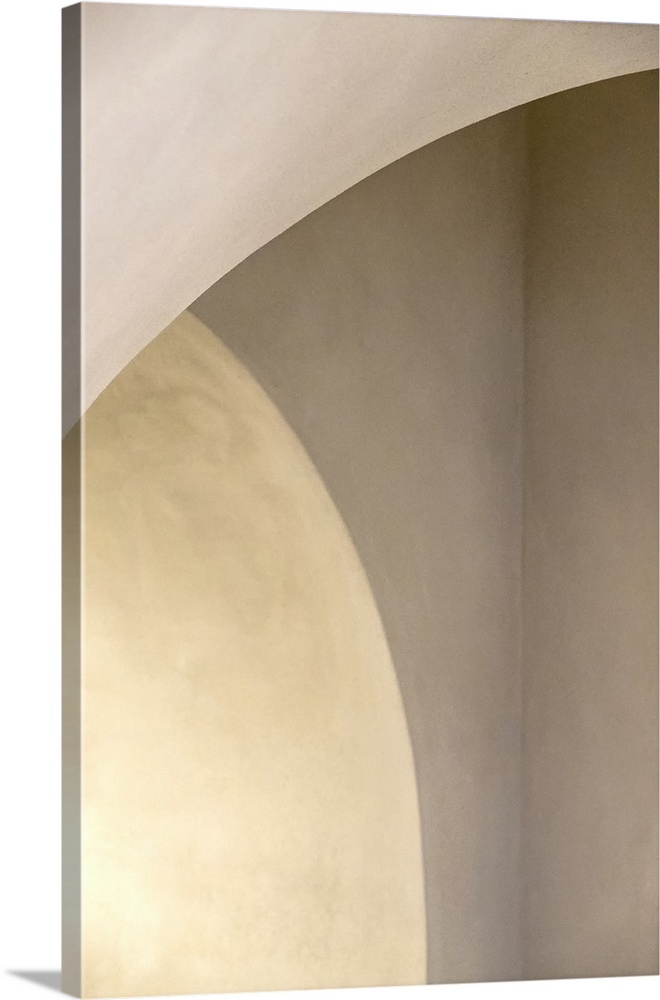 Abstract photo of curved arches with white light.