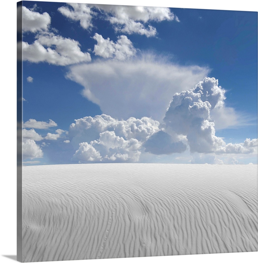 White sand desert with clouds