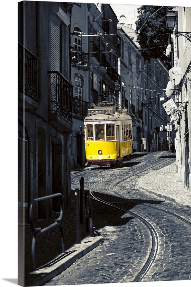 Yellow Tram No. 28 in Alfama District, Lisbon, Portugal.