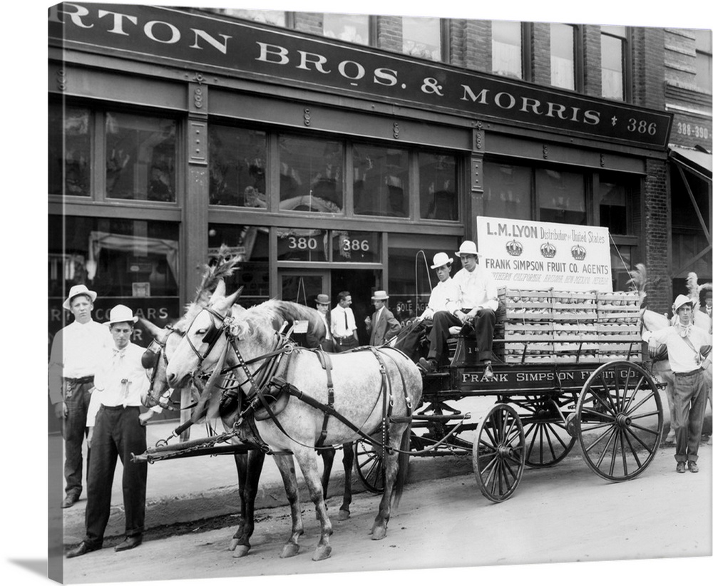 1890's Mule Drawn Fruit Delivery Wagon On City Street Surrounded By Men Looking At Camera.