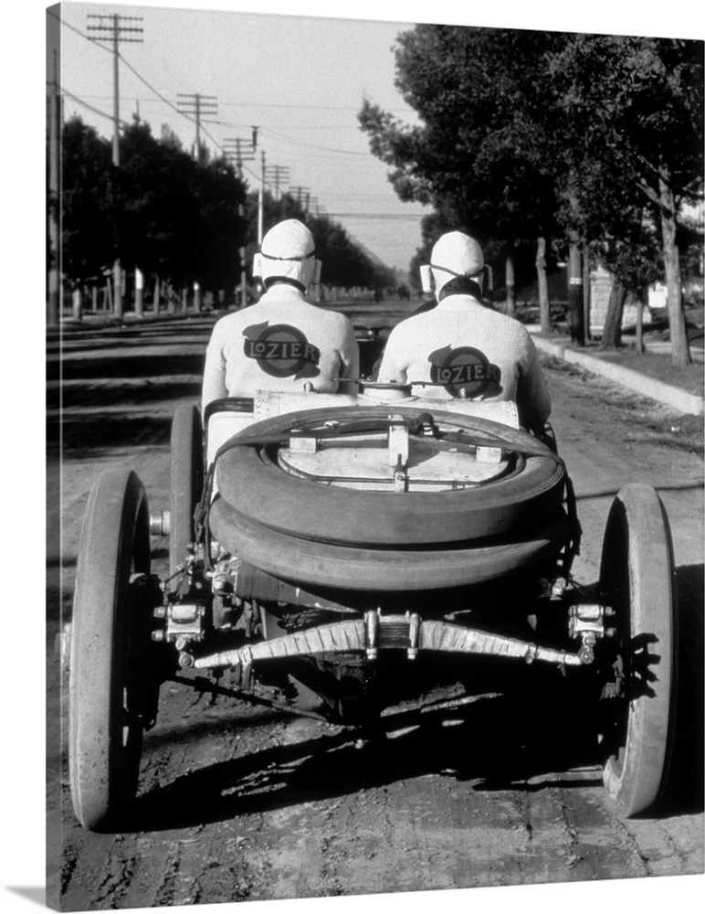 1900's 1910's Rear View Of Two Men Sitting In Antique Lozier Racing Road Rally Car.