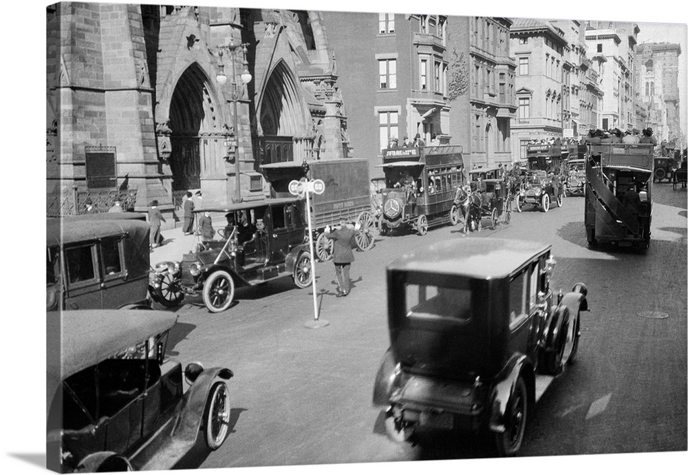 1900's 1912 Policeman And Traffic Semaphore On Fifth Avenue And 48th Street Before World War I Manhattan New York City USA.