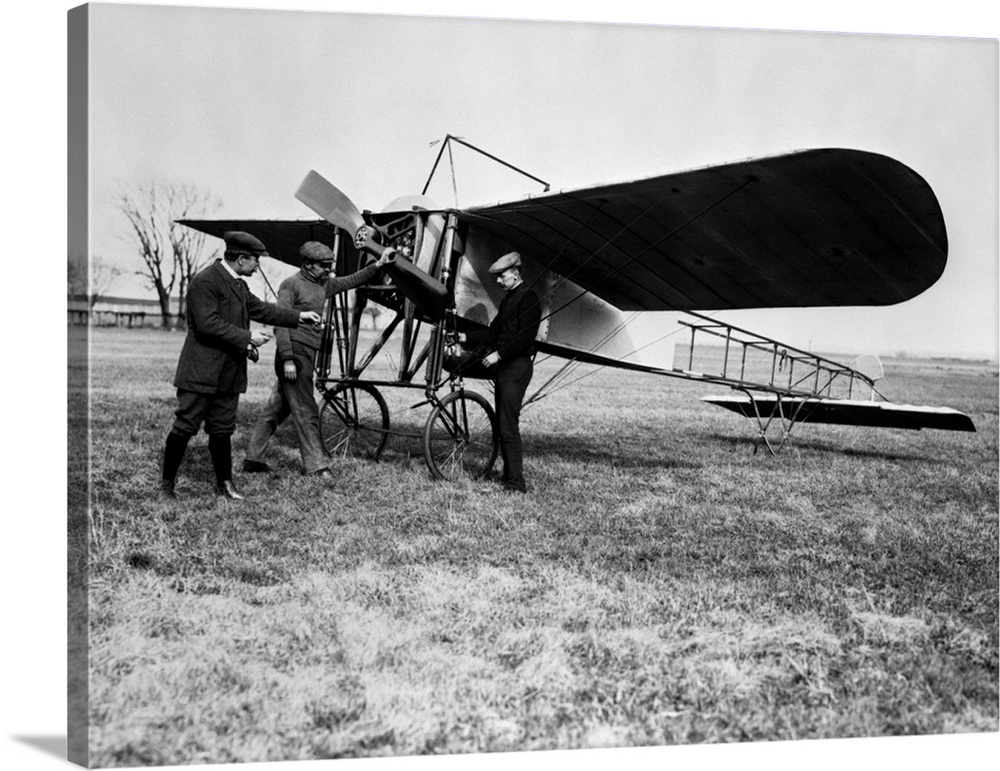 1910's Group Of Three Men Standing In Front Of Early Monoplane One With Hand On Propeller.