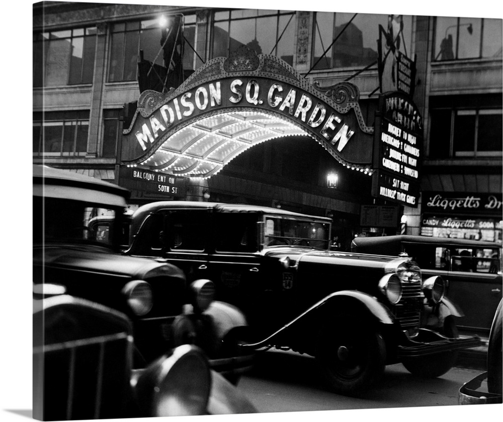 1920's 1930's Cars Taxis Madison Square Garden Marquee At Night Manhattan New York City USA.