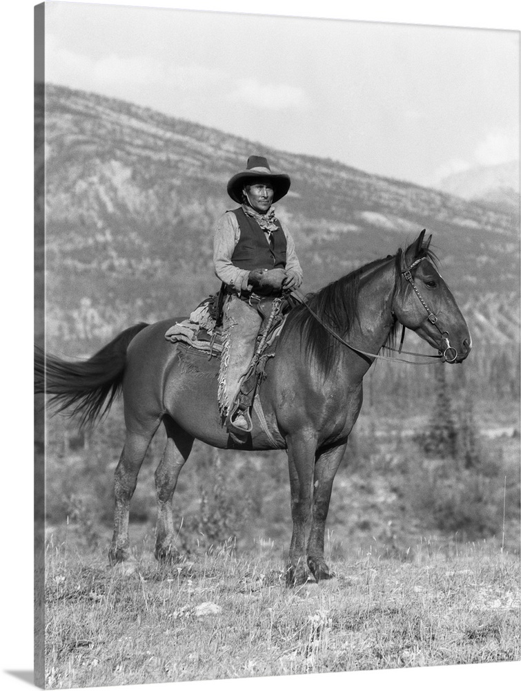 1920s Native American Man On Horseback Wearing Cowboy Clothes Stoney Sioux Alberta Canada.