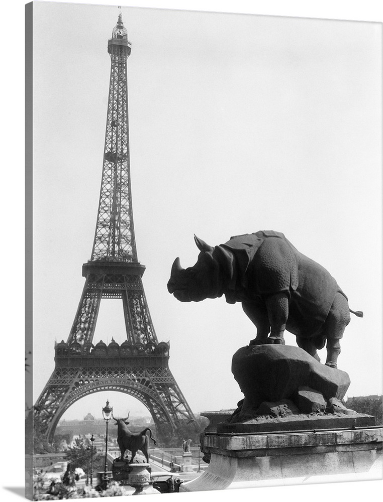 1920's Rhinoceros Statue In Foreground Eiffel Tower In Background Paris France.
