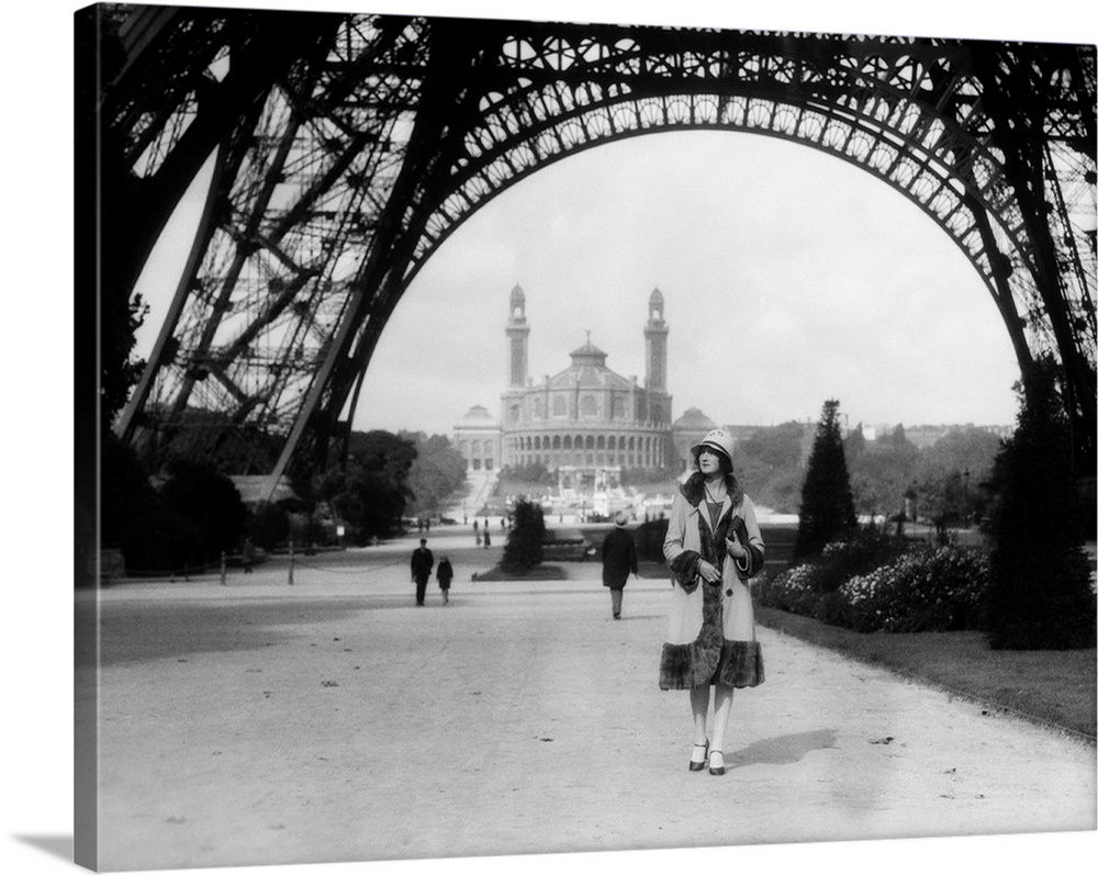 1920's Woman Walking Under The Eiffel Tower With The Trocadero In Background Paris France.