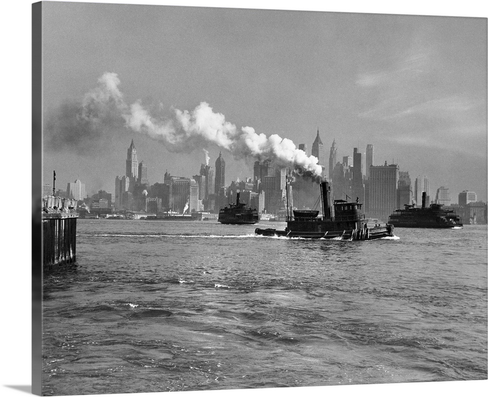 1930's 1933 Steam Engine Tug Boat And Staten Island Ferry Boats On Hudson River Against Manhattan Skyline New York City USA.