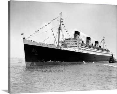 1930's 1936 Maiden Voyage Of Queen Mary Dwarfing Small Tugboat Moving Alongside It