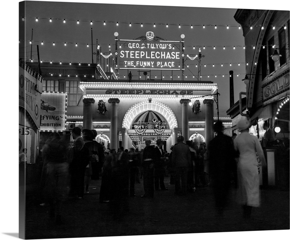 1930's 1940's Night Lights Amusement Park Brooklyn NY Entrance Steeplechase Park Funny Place Coney Island New York USA.