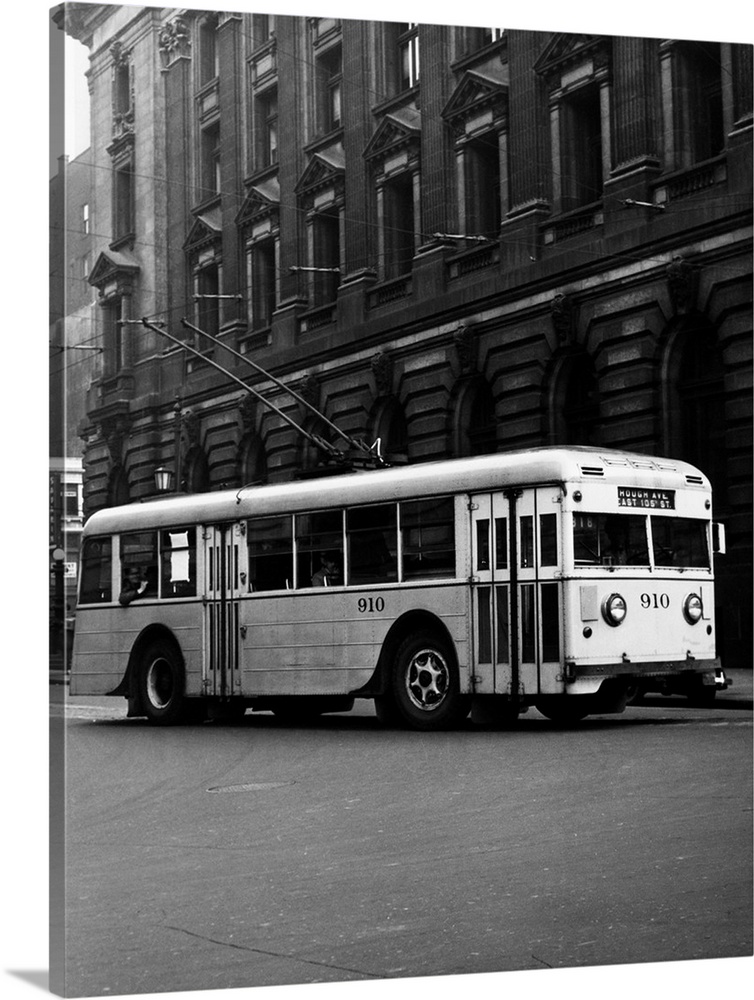 1930's 1940's Public Transportation Trackless Trolley Electric Bus About To Round Street Corner Cleveland Ohio USA.