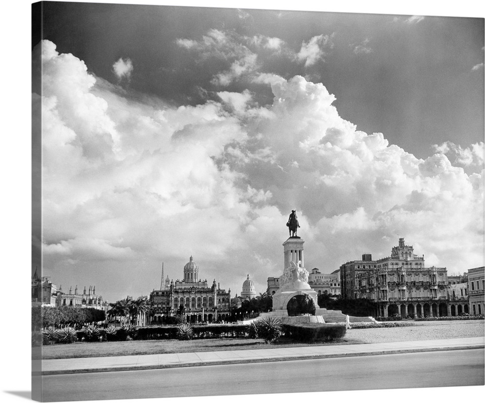 1930's 1940's Skyline Of Monument To Maxima Gomez In Center Dramatic Sky Clouds Havana Cuba.